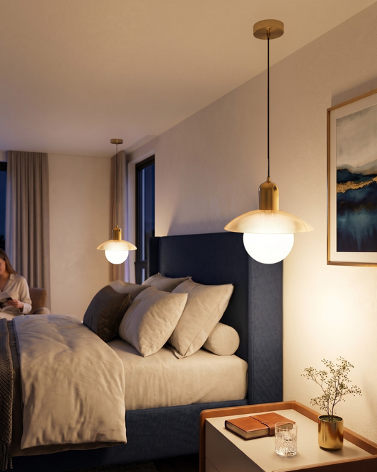Minimalist pendant light with frosted glass globe